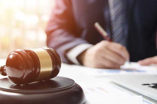Judge reviewing court documents