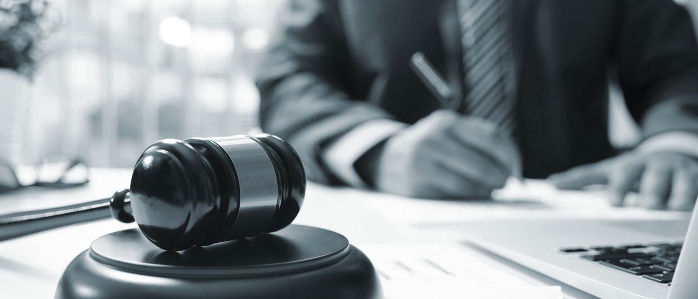 Image of a judge at his desk